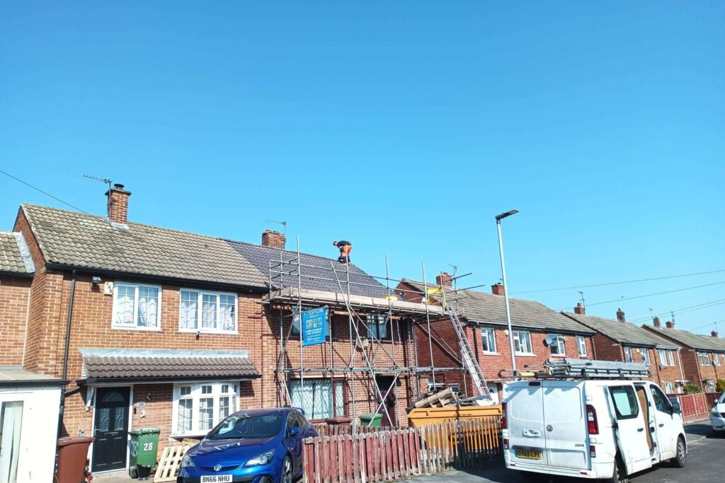 Scaffold up for a re-roof on a semi-detached house